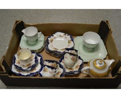 Teaware - a part Gladstone tea service, of Art Deco form and decoration, comprising bread plate, side plates, milk and sugar;