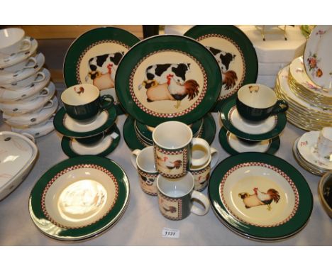 A Henry & Co. four-setting dinner service, forest green border with farmyard animal scenes, comprising dinner plates, side pl