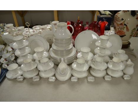 A comprehensive Royal Doulton Carnation pattern tea and dinner service for twelve, large quantity