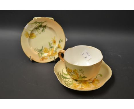 A Royal Worcester blush ivory cup, saucer and plate (3) 