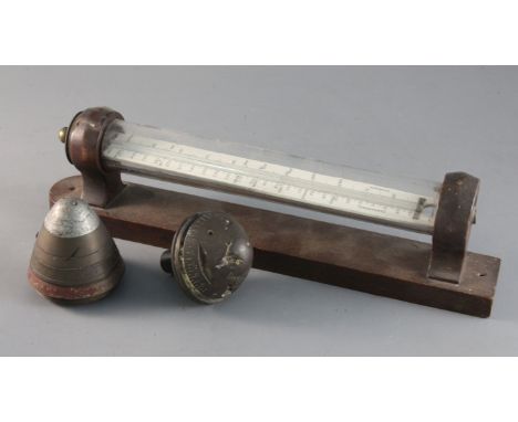 A wall mounted thermometer and two shell timer paperweightshttps://www.gorringes.co.uk/news/west-horsley-place-attic-sale-8th