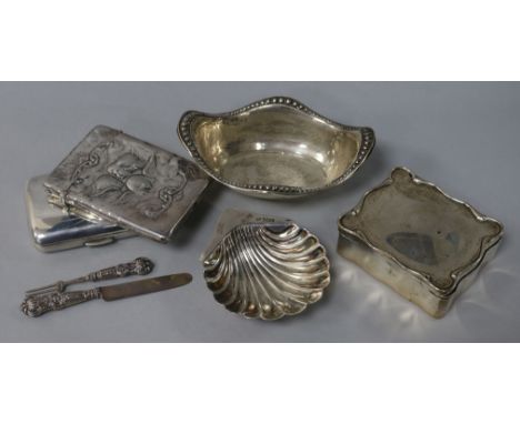 A George V silver trinket box, two silver dishes, two silver cases including Comyns card case and a knife and fork set