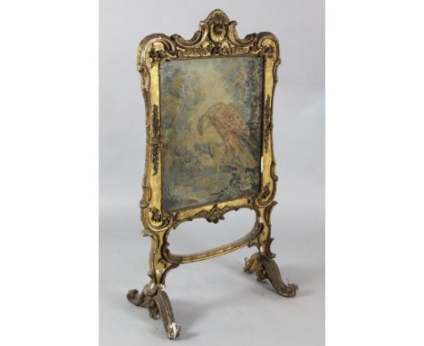 A Victorian giltwood firescreen with tapestry panel depicting an eagle 2ft 10in. H.3ft 10in.https://www.gorringes.co.uk/news/