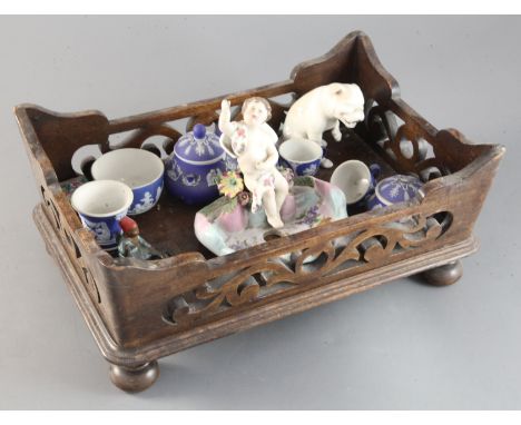 A group of assorted ceramic ornaments and a wooden tray, 12in.https://www.gorringes.co.uk/news/west-horsley-place-attic-sale-