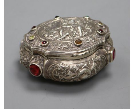 A 19th century German? embossed white metal and multi stone set snuff box and cover, 85mm.