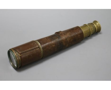 A Broadhurst, Clarkson &amp; Co Ltd brass four draw leather cased telescope