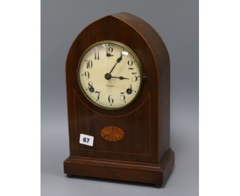 An Edwardian shell inlaid mantel clock
