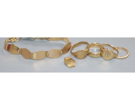 Four various 9ct gold rings and an engine-turned 9ct gold bracelet gross 21.8 grams.