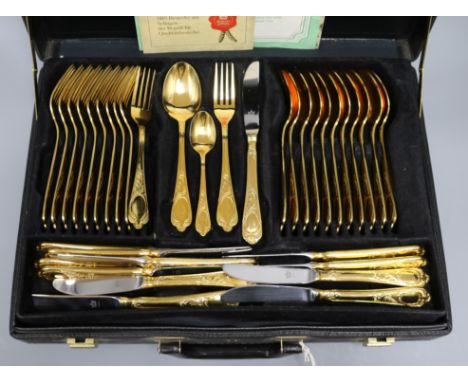 A service of SBS Solingen Bestecke 23/24 karat gold-plated flatware, model no. 25 'Wien', setting for 12 with serving impleme