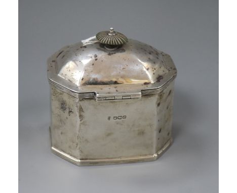 A George V silver octagonal tea caddy, Thomas Bradbury &amp; Sons, Sheffield, 1920, 10.5cm.