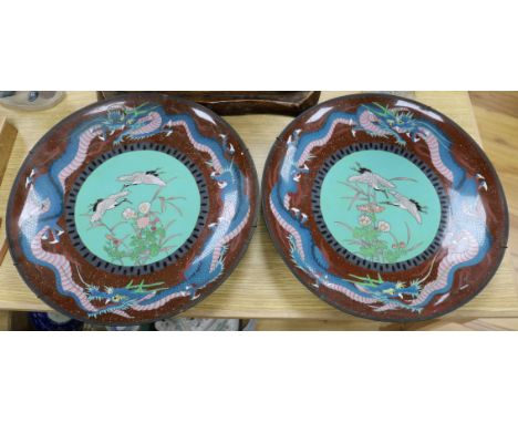 A pair of Japanese cloisonne enamel 'dragon' chargers diameter 45cm