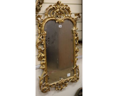 A Chippendale carved gilt wall mirror, the border finely pierced with scrolling acanthus leaves and foliage W.58cm