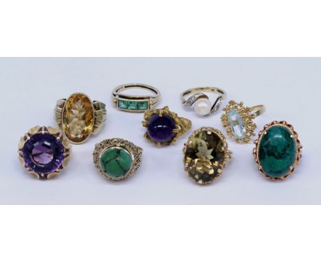 Reichhaltiges Konvolut mit 9 Ringen, alle mind. 585er GG, insg. 58,1 g: Ring mit Tatzenfassung und Amethyst, 750er GG, RG48,5