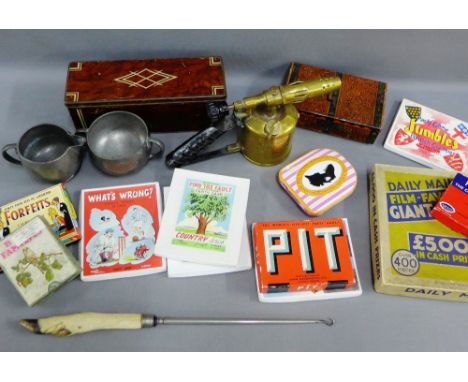 Mixed lot to include vintage tins, cocktail strainer, button hooks, sugar tongs, vintage card games, Liberty Tudric jug, crea