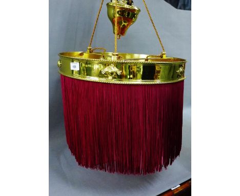 Early 20th century brass rise and fall light fitting with fringed shade 