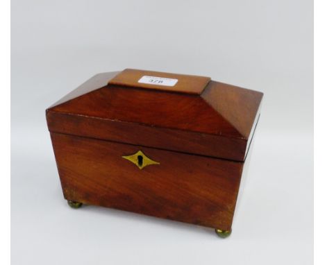 19th century mahogany sarcophagus shaped tea caddy on four bun feet, 20cm long