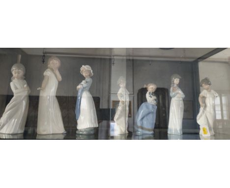 Seven Nao figures of girls, 19cm to 29cm. (7) 