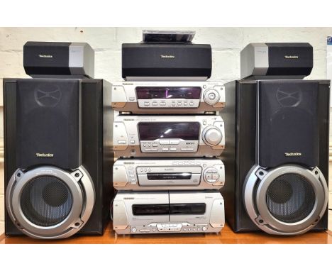 Technics stereo system : a twin cassette deck (RS-EH750), a 5-disc changer system (SL-EH750), a stereo tuner amplifier (SA-EH