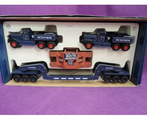 A Corgi 1:50 scale diecast, Pickfords, Diamond T Ballast x2 with 24 wheel girder trailer & steel casting load, boxed 55201