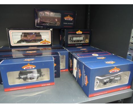 Eighteen Bachmann 00 gauge carriages and rolling stock, all boxed