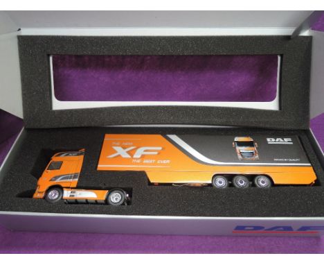 A Tekno 1:50 scale diecast, DAF XF 105 with box trailer,with mirrors, boxed 