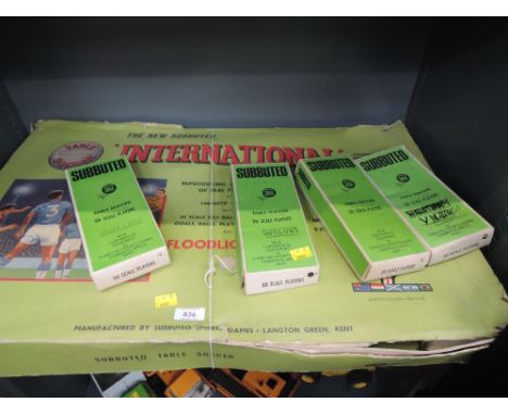 A Subbuteo boxed set, International, and four boxed part teams