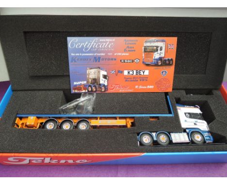 A Tekno 1:50 scale diecast, Scania R-series with flat bed trailer, Kerbey Motors, limited edition 101/130, with mirrors, boxe