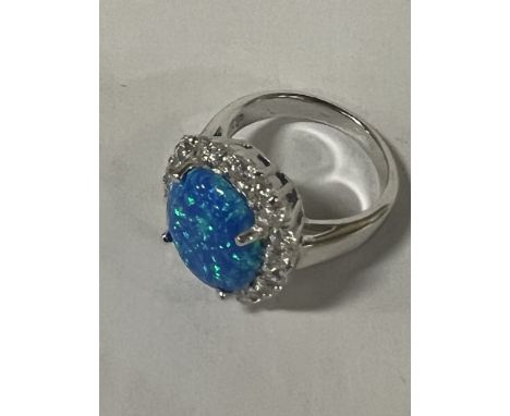STERLING SILVER OPAL RING WITH WHITE TOPAZ