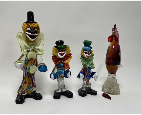 A collection of three handblown Italian Murano glass clown sculptures (tallest h. 32cm), together with a handblown cockeral w