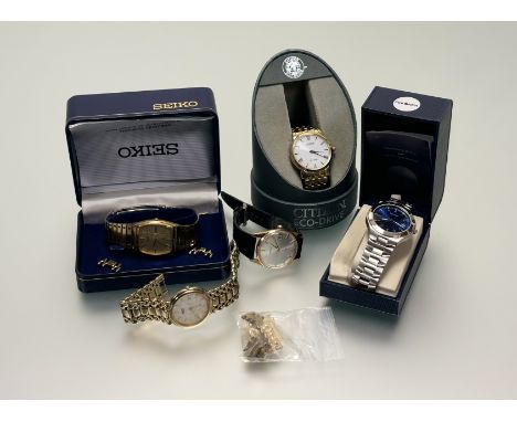 A Seiko gilt metal manual wind wristwatch with silvered dial baton hour markers and date complication working: d. x 3cm,a Sek
