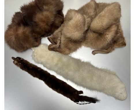 A collection of vintage fur garments comprising, a mink fur stole complete with tail and back legs and fastening clasp with p