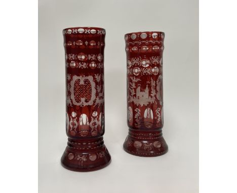 A Bohemian etched cut-to-clear ruby glass vase of cylindrical form with rabbit and deer decoration to body (h. 27.5cm), toget