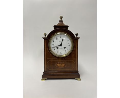 A Brook &amp; Son of Edinburgh Edwardian mantle clock with satinwood inlaid decoration of a butterfly, raised on four brass b