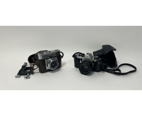 An Asahi Pentax ME camera with 50mm lens, complete with flashcube in box, together with a Zeiss Ikon Contessamat SE camera wi
