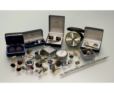 A  collection of twelve pairs of sleeve links, a compass key fob, a Whittnauer Speedway metal cased stopwatch: d x 4cm, a gil