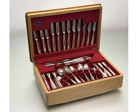 An Elkington oak canteen containing an Art Deco inspired epns suite of six place settings to include, table and side knives, 
