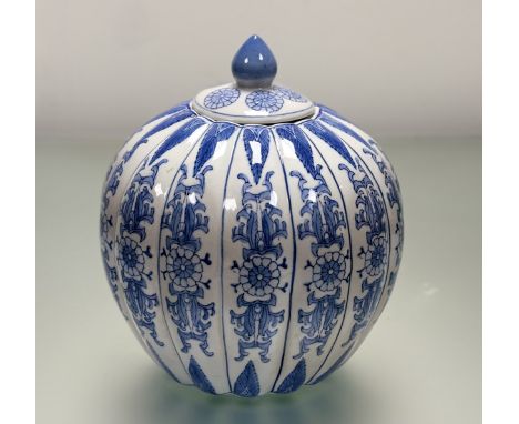 A modern Chinese blue and white lidder jar in pumpkin form. (h-27.5cm)