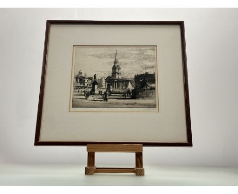 Terry Pledge (British 1887-1992), Trafalgar Square London, drypoint etching, signed pencil bottom right, label verso, framed.