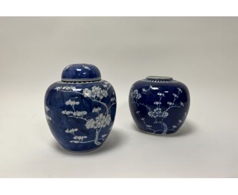 An early 20thc Chinese blue and white prunus blossom ginger jar with cover (h. 22cm), together with a similar Chinese 20thc b