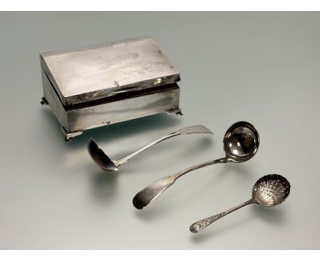 A Birmingham silver slope front cedar lined two division cigarette box on bracket feet with engraved initial C 1901-1926: h. 