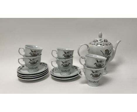 A boxed and unused promotional Hendricks Gin tea service comprising, a set of six teacups, all branded with the Hendricks log