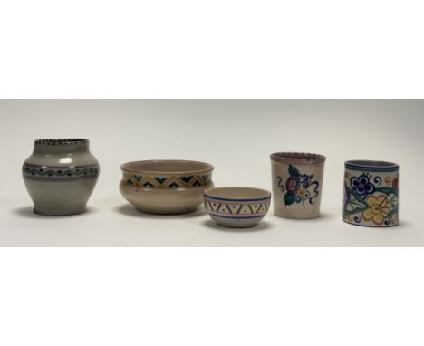 A collection of Carter Stabler Adams Poole Pottery decorative wares comprising a small grey glazed bud vase with banded purpl