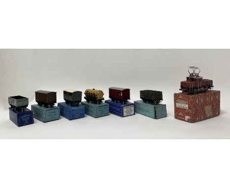 A collection of Hornby-Dublo wagons comprising, a Mineral Wagon D2, a Goods Van D1, a Cattle Truck D1, a Petrol Tank Wagon D1