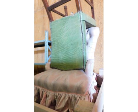 A button back nursing chair, upholstered in pick and grey fabric, on turned tapering legs, and leather upholstered mahogany s