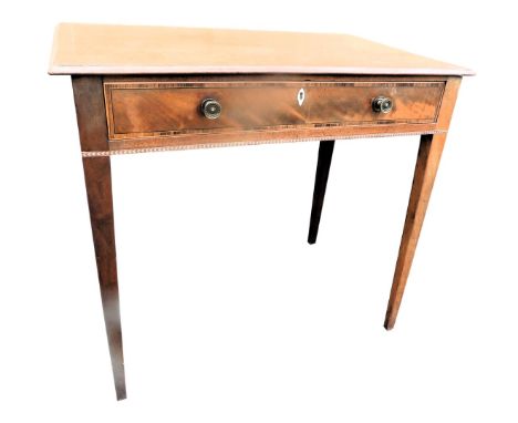 An early 19thC mahogany  boxwood strung and chequer banded side table, the rectangular top with a moulded edge above a single