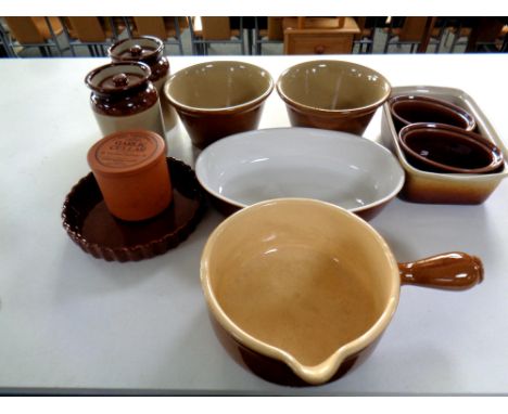 A box containing ceramic kitchenware to include flan dishes, storage jars, oven dishes, bowls etc  