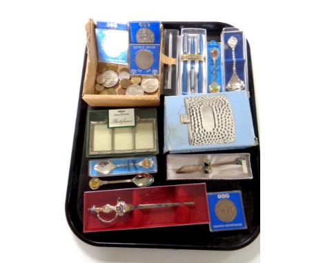 A tray containing foreign coins, crowns, boxed commemorative spoon and letter opener, hip flask etc  