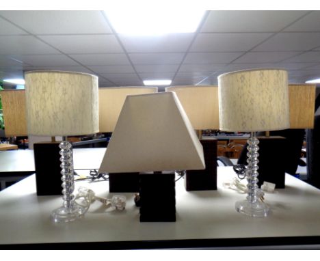 Two pairs of faux leather Marks and Spencer's table lamps with shades together with a further pair of table lamps with shades