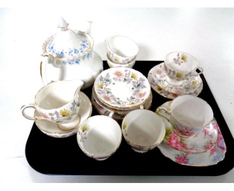 A tray containing part Foley Somerset bone china tea service together with a Royal Albert china trio and a Royal Albert Memor