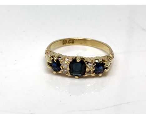 An 18ct gold sapphire and diamond ring, size K.  CONDITION REPORT: 3g